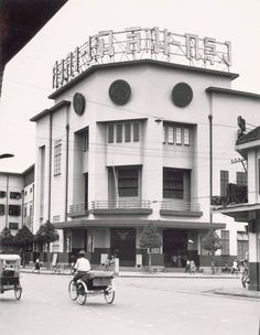 an old black and white photo of a building