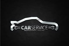 car service logo on black leather with silver lettering and an arrow pointing to the right