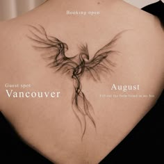 the back of a woman's shoulder with an image of a bird on it