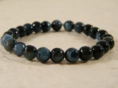 Men bracelet, Black blue bracelet, Agate bracelet, Stretch men bracelet, Men jewelry, Unisex beaded bracelet, Gem stone yoga bracelet Beautiful natural agate gem stone bracelet. The bracelet is starch and comfortable. The bracelet is unisex and look gorges on the hand. Size: 6/7/8 inch-for your choice. For more men bracelet: https://www.etsy.com/listing/592633706/ https://www.etsy.com/listing/606408437 Your item will be send in a Eco-friendly beautiful brown gift box It will be ready to ship 1-2 Men Bracelet, Yoga Bracelet, Bracelet Men, Men Jewelry, Agate Bracelet, Bracelet Black, Gem Stone, Blue Bracelet, Gemstone Bracelets