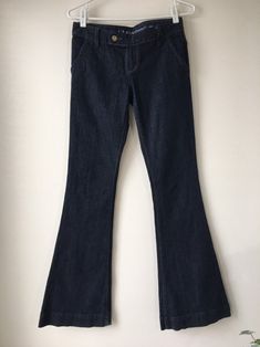 "Extra long vintage denim stretch flared Guess Jeans from the 90s. Low rise with Zipper fly and one top button Size: 26/36 Inseam: 36\" length from waist to hem: 43\" Hips: 38 '' diameter of Hem: 22\" Condition: Good vintage , 1 back pocket button missing, and some fraying on the hem Fabric: 98% Cotton, 2% Spandex Brand: Guess Made in Mexico Shipping was combined" Summer Linen Shirt, Casual Earrings, Summer Linen, Hem Jeans, Layered Tops, Flared Jeans, Guess Jeans, Plus Size Blouses, Linen Shirt