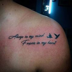 a man with a tattoo on his shoulder that says always in my mind forever in my heart