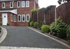 a house with a driveway in front of it