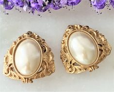 "Victorian Etruscan Style Antique Gold Tone Open Work Clip On Earrings with Large Oval Imitation Pearl Cabochons Earrings Measure 1 3/8\" Long x 1 3/8\" Wide Earrings are Slightly Domed Engraved Open Work Antique Gold Tone Metal Large Oval Imitation Pearl Cabochons are Natural Color and Measure 1\" Long x 5/8\" Wide Clip On Earrings Made in USA COMPLIMENTARY DOMESTIC SHIPPING" Fabric Headbands, Gold Pearl, Gold Tone Metal, New Vintage, Pearl Bracelet, Black Diamond, Antique Gold, Natural Color, Clip On