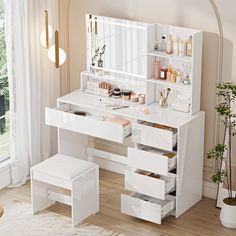 a white vanity table with drawers and stools