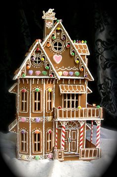 a gingerbread house with candy and candies on it