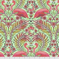 a pink and green floral pattern with flamingos