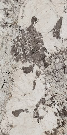 an image of a marble surface that looks like it has been painted white and brown