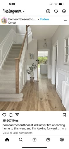 an instagramted photo of a house with stairs and wood flooring in the hallway