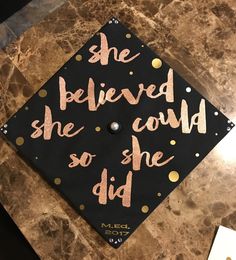 a graduation cap that says she believed she could so she did