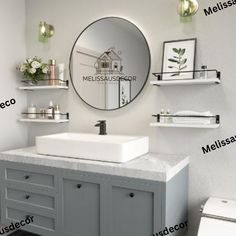 a bathroom with a mirror, sink and shelves on the wall next to a toilet