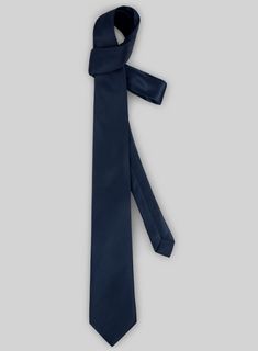 It's not just wedding and work guys are getting dressed up for these days, making a stylish selection of tailoring accessories essential for every man's wardrobe. 
 
 This tie would compliment your suits or blazers and will stand out with it's solid finish. 
 
 A must have for your neckwear collection that you won't find anywhere else. 
 
 Width at widest : 2.75 inches. Dapper Fitted Neckwear For Work, Dapper Standard Tie Neckwear, Dapper Standard Tie For Work, Tailored Professional Standard Tie, Classic Tailored Ties For Work, Semi-formal Tailored Suit And Tie Accessories, Tailored Suit And Standard Tie Accessories For Semi-formal Occasions, Tailored Suits With Standard Tie For Office, Professional Suit And Tie Accessories For Workwear