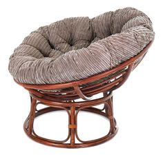 a wicker chair with a cushion on it