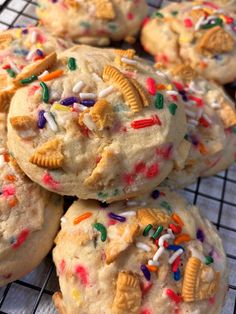 some cookies with sprinkles and candy on top