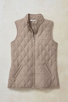 You spoke, we listened! We’ve updated our lightweight quilted vest for a more flattering fit – with enhanced elastic at the back waist for shaping, and a great everyday length. Ideal for in-between days or for adding a pop of color. Zip front, with a fabric zipper guard at the neck to protect your chin. Side pockets plus two inside pockets. Quilted Sleeveless Vest For Outdoor, Winter Quilted Cotton Vest, Quilted Sleeveless Winter Vest, Quilted Cotton Sleeveless Vest, Cotton Vest For Cold Weather/winter, Weekend Sweater, Vests Women, Winter Vest, Knit Denim