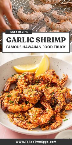 garlic shrimp with lemon wedges and parsley on the side