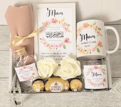 a mother's day gift box with coffee, tea and cookies in the middle