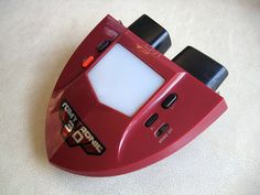 a red electronic device sitting on top of a table