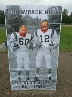 a sign with two children in football uniforms