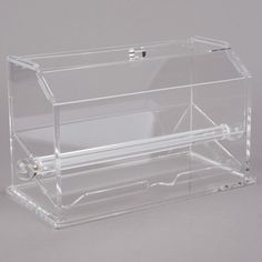 a clear acrylic box on a gray background