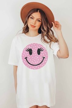 Wink Smiley Face Graphic T-Shirt. Designed for comfort and style. 100% Premium Cotton Unisex Sizing Classic Fit Funny Print Short Sleeve T-shirt For Loungewear, Fun Crew Neck T-shirt For Loungewear, White T-shirt With Funny Print For Spring, White Pre-shrunk T-shirt For Loungewear, White T-shirt With Sublimation Print For Spring, Casual Pink T-shirt With Smiley Face, Fun T-shirt With Sublimation Print For Spring, Trendy Smiley Face Loungewear Tops, Trendy Smiley Face Tops For Loungewear