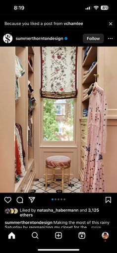 an image of a room with clothes on the shelves and a window in the corner