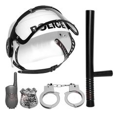 a police helmet and handcuffs are on display with other accessories including a pair of scissors