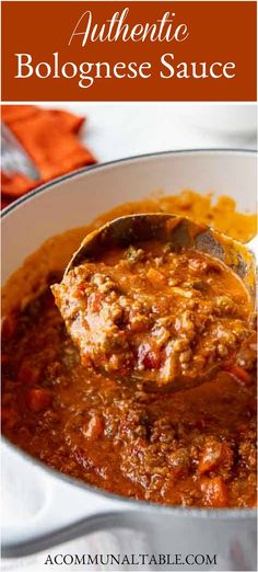 authentic bolognesee sauce in a white bowl with a spoon