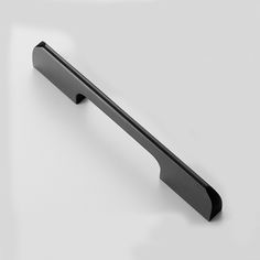 a black door handle on a white background