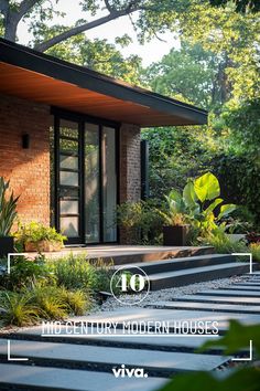 a modern house surrounded by greenery and trees with the words 10 mid century modern houses via