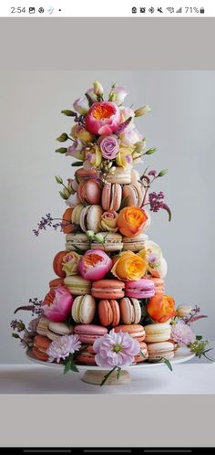 a cake made out of macaroons and flowers