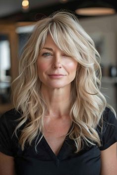 27. Soft Waves with Long Bangs - Medium-Length Hairstyles For Women Over 40 - Medium-Length Hairstyles For Women Over 40 Long Layered Hair With Side Bangs Over 40, Medium Length Straight Hairstyles With Bangs, Jenny Garth Hairstyles, 40 Year Old Hairstyles Long Hair With Bangs, Long Bangs Blonde Hair, Hairstyles Waves Medium, Medium Haircut With Long Bangs, Long Hairstyles Over 50 Women New Looks, Blended Bangs Into Hair