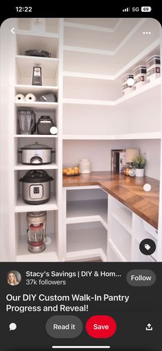 an image of a kitchen with white cabinets and shelves