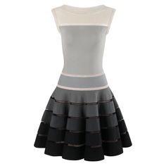 ALAIA PARIS c. 2010 Monochrome Ombre Wool Silk Fit & Flare Mini Dress Brand / Manufacturer: Alaia Paris Circa: 2010 Designer: Azzedine Alaïa Style: Fit and Flare Mini Dress Color(s): Shades of Cream, Grey, Black Lined: Yes Marked Fabric: "76% Lana Wool", "12% Polyester, 6% Silk" Additional Details / Inclusions: Alaia Paris c. 2010 fit & flare mini dress. Composed of wool, polyester, and silk. Beige, grey, and black monochrome ombre colors that goes from light down to dark. Form fit along torso t Beaded Flapper Dress, Fit And Flare Mini Dress, Skater Mini Dress, Black Monochrome, Shades Of Cream, Light Down, Blue Kimono, Knit Shift Dress, Azzedine Alaia