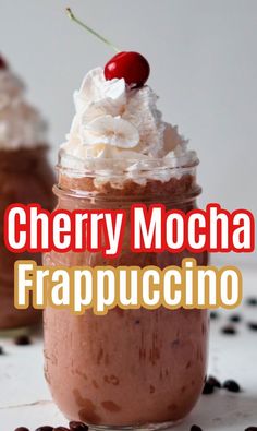 two jars with whipped cream and cherries in them, one has a cherry on top