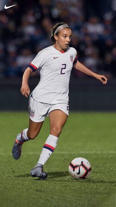 a female soccer player in action on the field