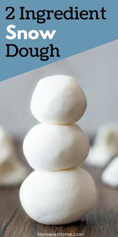 two white rocks stacked on top of each other with the words, 2 ingredient snow dough