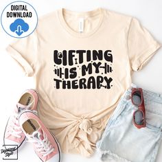 a t - shirt with the words gifting is my therapy on it next to shorts and sneakers