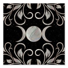 a black and white wall hanging with an abstract design in the middle, featuring three crescents