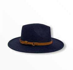 CLARKE - NAVY BLUE A new spin on our best-selling hat, the Clarke fedora embodies a balance between modern and vintage with its simplistic design, which is offset by a hand-stitched leather headband. Available in size Medium 54-58cm and Large 58-62cm. Features an adjustable inner strap to ensure your hat is the proper fit. Removable headband FREE shipping on every order Leather Headband, Dope Hats, Leather Headbands, Wide Brim Fedora, Simplistic Design, Stitching Leather, Wide Brimmed, Hand Stitched, Fedora