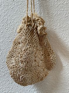 "Vintage crocheted hand bags or purses for a bride to carry at her wedding, for the bridesmaids, or as a shower gift.  Both have crocheted draw strings for closure. Use as an evening purse or costuming. A wonderful addition to a collection.  You choose which you want at check out. If you want both you will need to add them to your cart separately. The almond color one is the Irish Rose crochet style with the rose on both sides. The drawstrings are shorter so this would be a wrist length purse to Handmade Beige Crochet Bag For Evening, Summer Cream Crochet Bag As Gift, Beige Crochet Bag For Gift, Beige Crochet Bag As Gift, Beige Handmade Crochet Evening Bag, Cream Wedding Bags For Summer, Elegant Woven Crochet Bag As Gift, Elegant Woven Crochet Bag As A Gift, Handmade Natural Crochet Bag For Evening