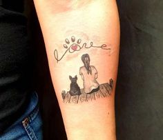 a woman's arm with a tattoo on it that says love and a dog