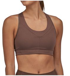 A sports bra designed to solve common problems of discomfort so it can be just as invaluable at the gym as it is on the trail. Made of polyester and elastane. Wireless t-shirt cups have unique light stretch padding for a more customized level of fit and control. Entire front is padded for stabilizing support. Scoop neckline has covered elastic edge for fit. Sewn-on, restricted stretch inner elastic underband for hold. Padding at front sides for extra support. Sides and back are soft stretch micr Patagonia Logo, Sports Bra Design, Brown Shade, Racerback Sports Bra, At The Gym, Patagonia Womens, The Trail, Scoop Neckline, Patagonia