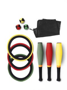 an assortment of sports equipment on a white background, including rubber rings and other accessories