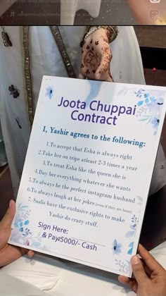 a woman holding up a sign with the words jotta chupai contact on it