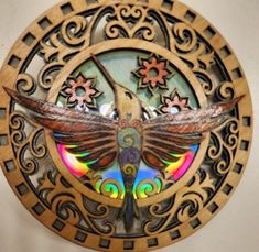 a wooden clock with a dragon on it's face