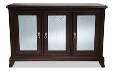 a wooden cabinet with mirrored doors on the top and bottom drawers in dark brown wood