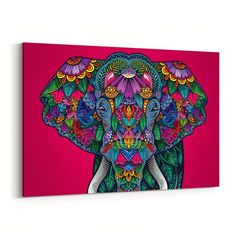 an elephant painted in bright colors with flowers on it's head, against a pink background