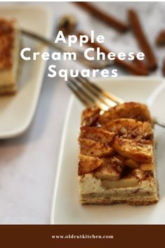 apple cream cheese squares are served on white plates with forks and cinnamon sticks in the background