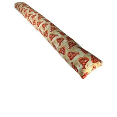 an image of a roll of pizza on a white background with red and orange designs